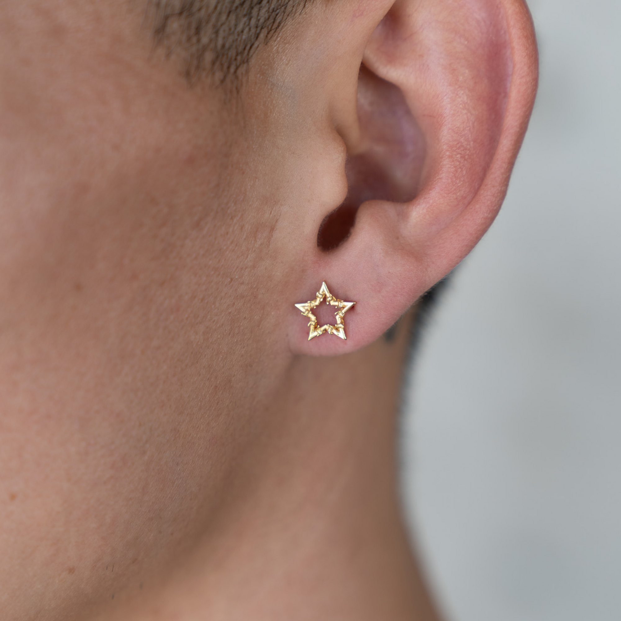GOLD BARBWIRE STAR EARRINGS